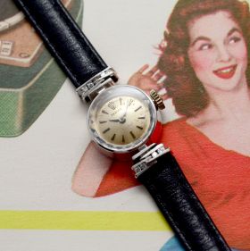 Rolex Circa 1960s Lady's "Orchid" 16mm Ref.2252 cocktail watch in 18KWG with Diamonds