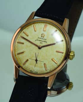 Omega, vintage 35mm C.1962 Ref.14389-8 aged dial small seconds manual winding in pink gold top over steel with screw back