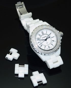 Chanel Lady's 34mm J12 H0967 quartz date factory diamonds bezel in White Ceramic