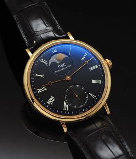 SHH2008 IWC, 46mm Ref.5448 Limited Edition of 20pcs "Portofino Hand Wound Moon phase" in 18KPG with glass back & dated paper
