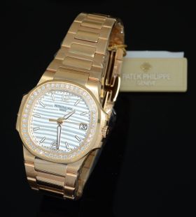 *NEW* Patek Philippe, lady's "Nautilus" Ref.7010/1R-011 in 18KPG with 0.77carats of diamonds