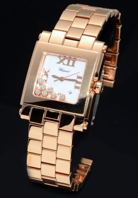 Chopard, lady's "Happy Sport" Ref.275322-5001 in 18KPG with 7 floating Diamonds