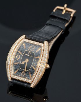 Milus, lady's "Cirina Joaillerie" Tonneau in 18KPG with 1.88 carats Diamonds