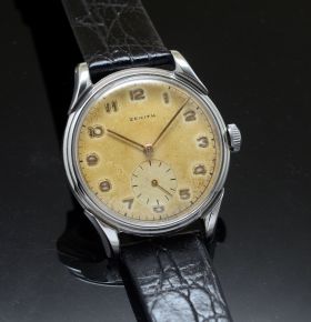 C.1950s Zenith 33mm manual winding Cal.106 in Steel with fancy lugs and small seconds