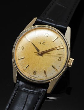 Circa 1950s Zenith, 34mm manual winding with sweep center seconds in yellow gold shell case and steel screw back