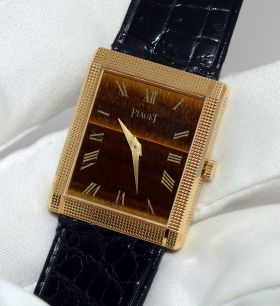 C.1970s Piaget, mid-size rectangular Tank Ref.9151 with Clous de Paris & Tiger eye stone dial ultra-slim hand wind in 18KYG