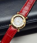 Chopard, 23mm lady's in 18KYG Ref.13/6079 with diamonds & rubies