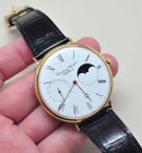 2004 IWC, 46mm Ref.5251 "Portofino Hand Wound Moon phase" in 18KYG with glass back. B&P