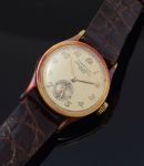 C.1941 Patek Philippe & Co, rare 28mm "Calatrava" Ref.448 retailed by Tiffany & Co with small seconds in 18KYG