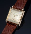 C.1948 Tiffany & Co by IWC top grade manual winding Cal.62 in 14KYG Square case with concave bezel & flared lugs