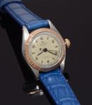 Rolex C.1950 24mm Lady's Oyster Precision Ref.5005 manual winding in 9KPG engine-turned bezel on steel case