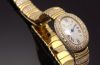Cartier Lady's Mini Baignoire quartz in 18KYG with bracelet and Diamonds. B&P
