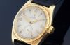 C.1951 Rare Rolex 31.5mm Oyster Perpetual Bubbleback Ref.6011 Chronometer Explorer dial small seconds in 14KYG engine turn bezel