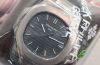 Patek Philippe, 40mm "Nautilus" Ref.5711G-001 automatic date in 18KWG & leather strap