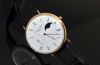 2004 IWC, 46mm Ref.5251 "Portofino Hand Wound Moon phase" in 18KYG with glass back. B&P