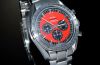 2010 Unused Omega, 42mm "Speedmaster Michael Schumacher, The Legend" auto/date Chronograph Ref.35066100 Red dial in Steel. F/Set
