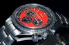 2010 Unused Omega, 42mm "Speedmaster Michael Schumacher, The Legend" auto/date Chronograph Ref.35066100 Red dial in Steel. F/Set