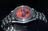 2010 Unused Omega, 42mm "Speedmaster Michael Schumacher, The Legend" auto/date Chronograph Ref.35066100 Red dial in Steel. F/Set