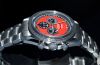 2010 Unused Omega, 42mm "Speedmaster Michael Schumacher, The Legend" auto/date Chronograph Ref.35066100 Red dial in Steel. F/Set