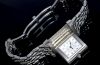 Jaeger LeCoultre, lady's "Reverso Duetto" 266.8.44 manual winding dual face in Steel with diamonds