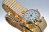 C.1990s Cartier, 25.5mm lady's "Vendome" quartz with date in solid 18K Tri-gold with bracelet. Box