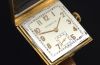 C.1946 Tiffany & Co by CH Meylan top grade manual winding in 18KYG rectangular case & faceted lugs
