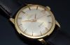 C.1962 vintage Omega 34mm Genève automatic date OT 14703 in 18KYG with faceted lugs