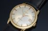 C.1962 vintage Omega 34mm Genève automatic date OT 14703 in 18KYG with faceted lugs