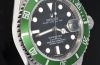 Rolex, 40mm New Old Stock Oyster Perpetual Date 50th anniversary "Green Submariner" Ref.16610LV Chronometer in Steel. V Series