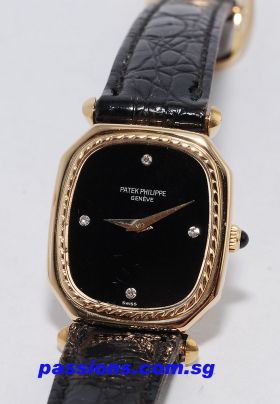 Patek Philippe, Lady's in 18KYG with Onyx dial